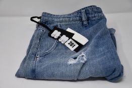 A pair of as new Nine In The Morning jeans (Size TG28?).