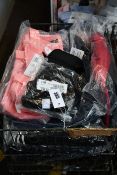 A quantity of as new Adidas clothing and accessories.