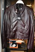 A lady's as new Belstaff Mollison jacket (UK 8 - RRP £795) (Damage to back and sleeve - sold as