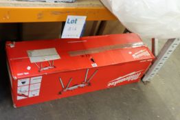 One boxed Milwaukee MSL2000 mitre saw leg stand.