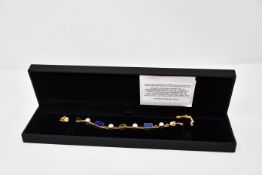 One lady's boxed as new Paula Bolton Vermeer bracelet.