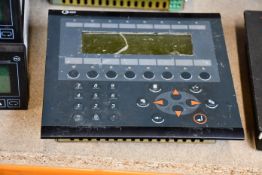 A pre-owned Beijer Electronics E300 HMI Operator Panel (Sold for spares or repair).
