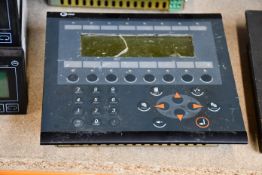 A pre-owned Beijer Electronics E300 HMI Operator Panel (Sold for spares or repair).