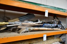 A quantity of garden tools and related items to include spades, hoes and fiskar long handled