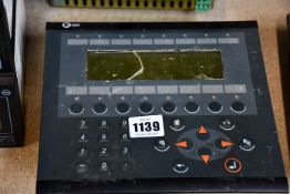 A pre-owned Beijer Electronics E300 HMI Operator Panel (Sold for spares or repair).