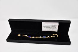 One lady's boxed as new Paula Bolton Vermeer bracelet.