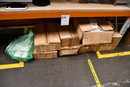 Nine boxes and a bag of No Idea pocket notebooks.