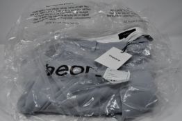 A pair of as new Theory Treeca cropped trousers in mist blue (Size 0 - RRP $295).