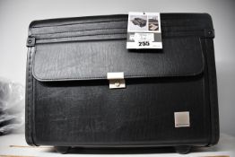 An as new Monolith leather look rolling Pilots case in black.