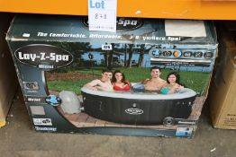 A boxed Lay-Z-Spa Miami in black.