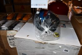 A large box of Beechfield snapback hats.