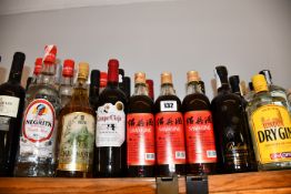 A quantity of assorted alcohols to include vodkas, gins, wines and cocktails (Approximately 30