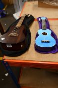 A Makala Ukulele MKCE semi acoustic and Malani ukuleles MUKS-30-PP.