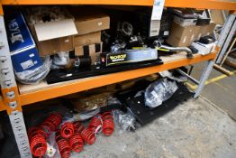 A quantity of miscellaneous car parts and related items.