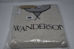 An as new JW Anderson embroidered logo sweatshirt (M?) (RRP £220).
