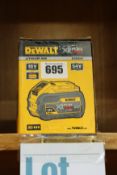 One boxed Dewalt lithium ion XR flex volt battery (18 volt).