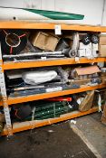 Three shelves of miscellaneous items to include plumbing and tarpaulins.