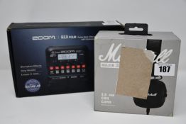 One boxed Zoom G1X Four Multi Effects Processor and one pair of Marshall Major III Foldable
