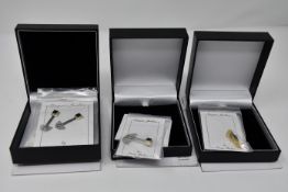 One pair of Bauhaus earrings, one Bauhaus pendant and one Vermeer pendant, all by Paula Bolton and