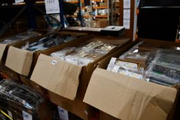 Four boxes of assorted as new phone cases and wallets (Approximately 2000 items).