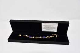 One lady's boxed as new Paula Bolton Vermeer bracelet.
