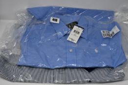 An as new Ralph Lauren Polo classic fit blue shirt (Size 8) and an as new Ralph Lauren classic fit