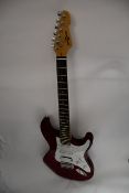 One boxed Gear4Music LA electric guitar in wine red with gig bag and jack cable.