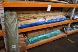 A quantity of garden related items to include bamboo fencing, netting and rotary line.