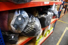 Ten bags of clothing and related items.