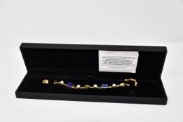 One lady's boxed as new Paula Bolton Vermeer bracelet.
