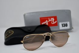 A pair of as new Ray Ban sunglasses.