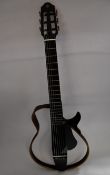 One boxed Yamaha SLG200N nylon string silent guitar.