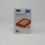 A boxed as new LaCie Rugged Thunderbolt USB-C 2TB Portable External Hard Drive (Box opened).