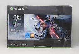An Xbox One X 1TB Console in Black (Model: 1787) (Console only, no controller included. Appears as