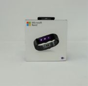Five boxed as new Microsoft Band Fitness Trackers (Size Large) (Boxes sealed).