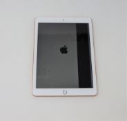 A pre-owned Apple iPad 9.7
