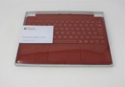 A boxed as new Microsoft Surface Pro Signature Type Cover in Poppy Red (for Surface Pro 5,6 & 7) (