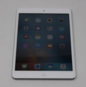 A pre owned Apple iPad mini Wi-Fi Only/1st Gen 16GB in white (Serial: F4KK7C0SF196) (iCloud