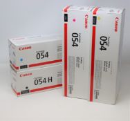 A set of four Canon 054 toner cartridges, boxed as new (boxes sealed) - 1x black, 1x cyan, 1x