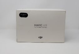 One boxed DJI MAVIC AIR FLY MORE COMBO (refurbished unit).