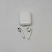 A pre-owned pair of Apple AirPods 2 with Wireless Charging Case (Some cosmetic marks).