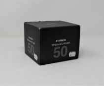 A boxed as new Fujifilm Fujinon XF 50mm F2 R WR Lens (Some cosmetic damage to box).