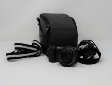 A pre-owned Sony Alpha a5100 Mirrorless Digital Camera with 16-50mm F3.5-5.6 Lens, a Sony NP-FW50