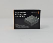 A boxed as new Blackmagic Design BiDirectional SDI/HDMI Micro Converter (Some light cosmetic