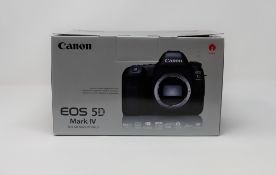A boxed as new Canon EOS 5D Mark IV (WG) 30.4MP Digital SLR Camera (Body only) (Some light