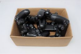 Six pre-owned Sony PlayStation 4 DualShock 4 Wireless Controllers in Black (Model: CUH-ZCT2U) (