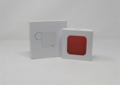 A boxed as new iTraq Nano Location Tracking Device and a boxed as new iTraq Nano Silicone Case (