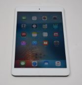 A pre owned Apple iPad mini Wifi Only/1st Gen 16GB in white, cosmetic wear, (Serial DMPNM9P4F196) (