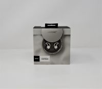 A pre-owned pair of Bose Noise Masking Sleepbuds with box, storage pouch and spare sleep-tips.