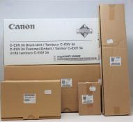 A boxed as new Canon C-EXV 34 Drum Unit and several boxed as new printer assembly parts; Paddle